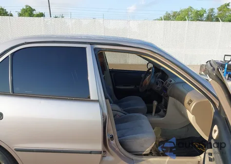 1999 Toyota Corolla Ce from USA, damaged, VIN 1NXBR12E9XZ159403